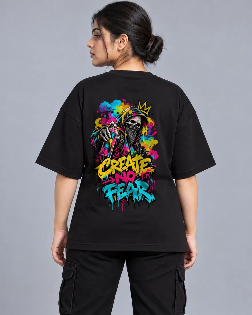 Woman wearing a streetwear tee with a large Create No Fear back print
